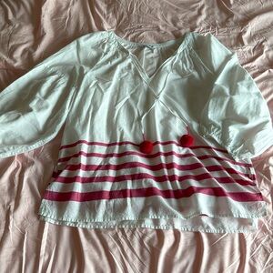Women’s Tommy Bahama, size large top. White with pink stripes and pink pom-poms.